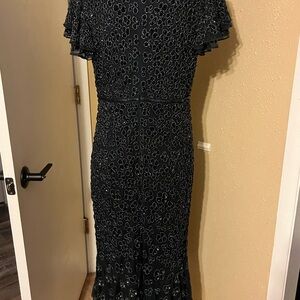 Flutter sleeve navy blue dress.